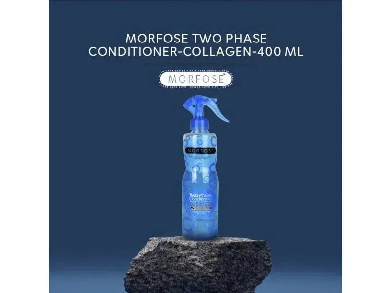 Morfose 2 Phase Conditioner Spray 400ml bottle on rock display against dark blue background.
