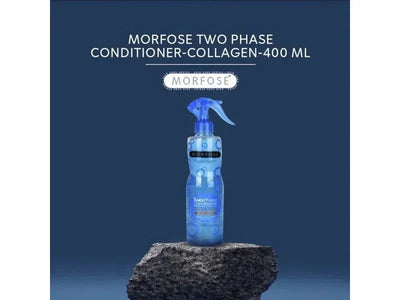 Morfose 2 Phase Conditioner Spray 400ml bottle on rock display against dark blue background.