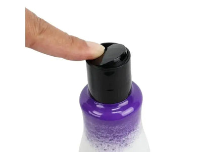 Morfose "No Yellow" Silver Shampoo bottle with finger pressing the cap, showing purple and white design.