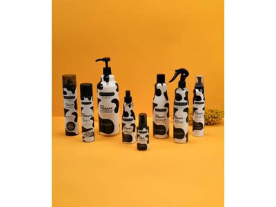 Morfose Milk Therapy Trockenshampoo 200ml bottle with cow-print design for instant hair freshness and volume.