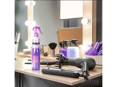 Morfose 2 Phase Conditioner Spray 400ml on salon table with hair styling tools.
