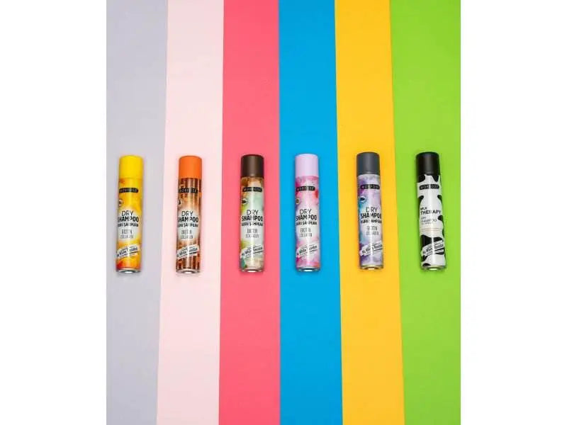 Morfose Milk Therapy Trockenshampoo assortment on colorful background showing various scents.